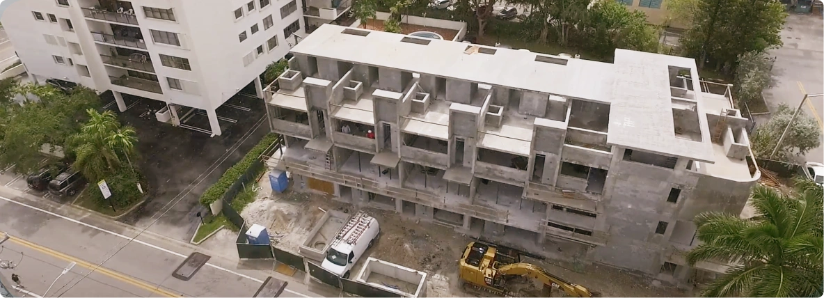 Aerial view of a multi-story residential building under construction in South Florida